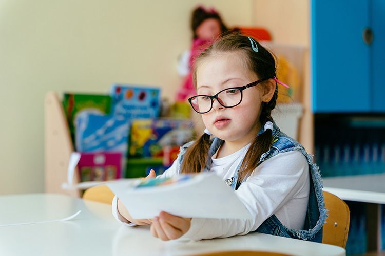 Child looking at assignment